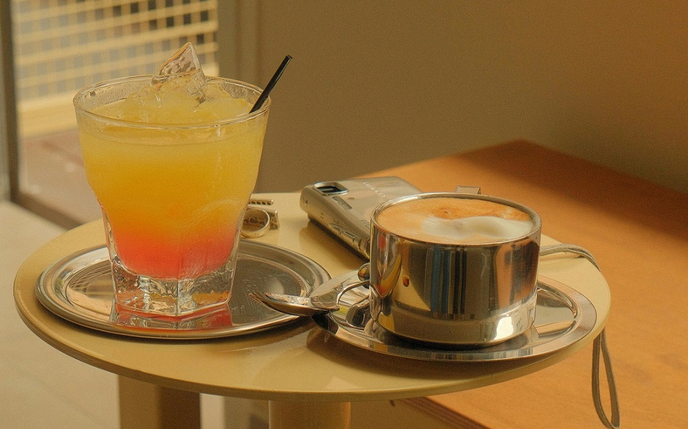 Black disposable plastic coffee stirrer for beverages