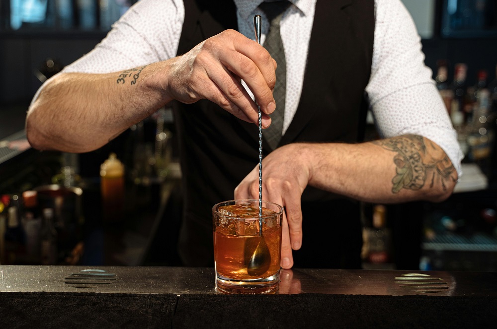 Bartenders use stainless steel swizzle sticks to stir drinks.