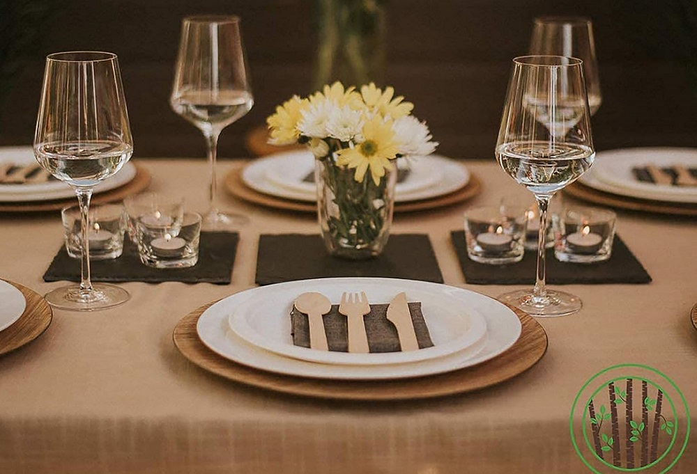 Set the dinner table with disposable dinnerware sets.