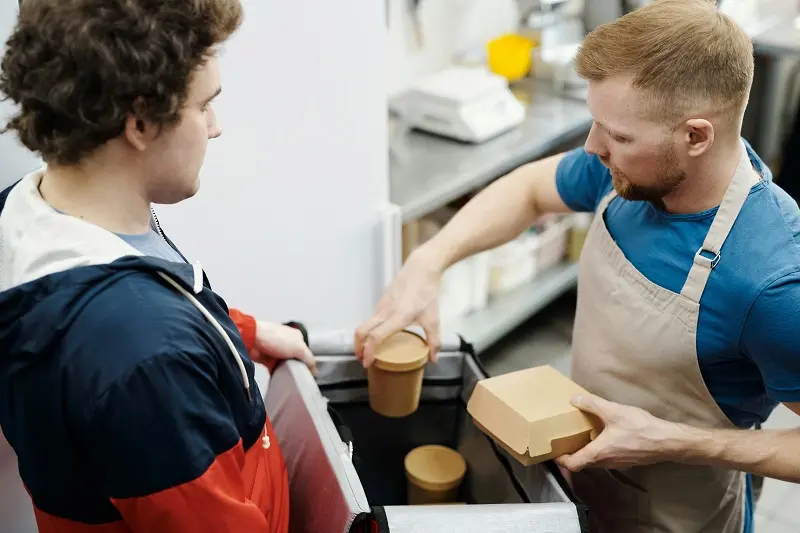 Using biodegradable takeout containers and utensils
