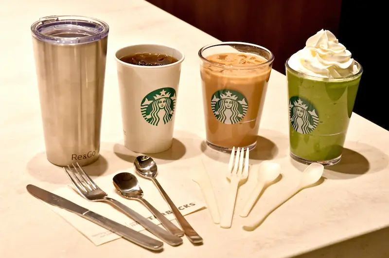 Starbucks disposable coffee cups and reusable coffee cups, stainless steel cutlery sets and biodegradable cutlery sets
