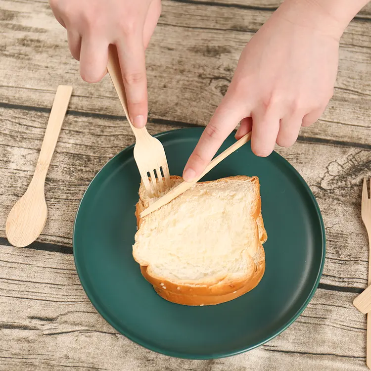 Cutting bread with a bamboo knife
