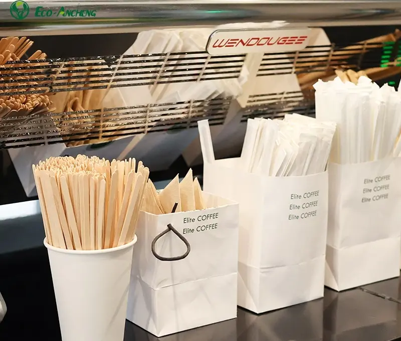 Disposable stirrers in coffee shop dispensers