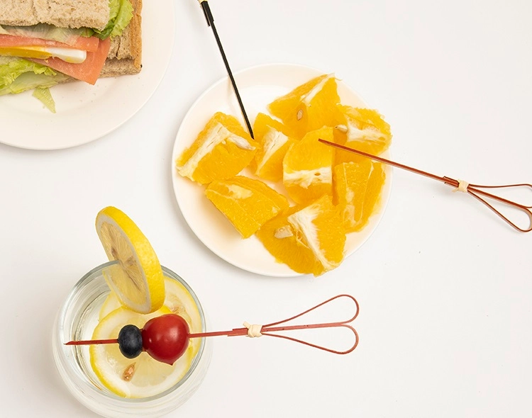 Biodegradable heart-shaped sticks for beverages and fruit.